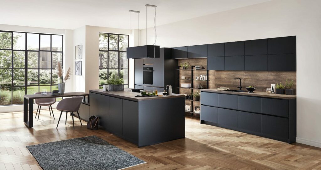 Nobilia Matt Black Wood Handleless Open Plan Kitchen 2021 | Kitchen Warehouse Winchester