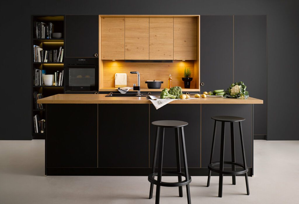 Schuller Dark Matt Wood Open Plan Kitchen With Island | Joshua Donald Kitchens, Dunstable